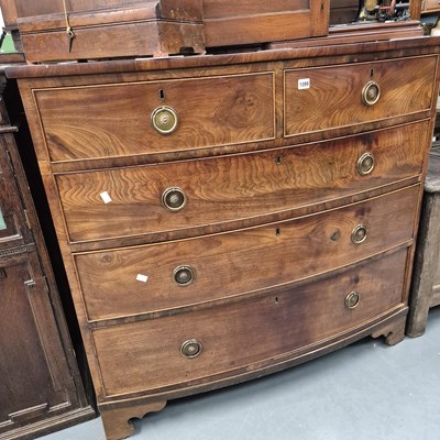 Lot 1099 - An early 19th -century mahogany bow-front...