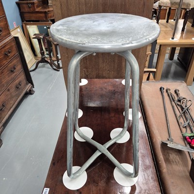 Lot 1109 - An alloy stool