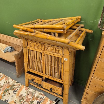 Lot 1132 - A vintage bamboo side cabinet and a folding chair