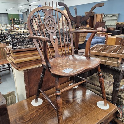 Lot 1155a - A 19th- century wheelback Windsor armchair....