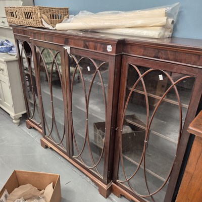 Lot 1172 - A late 19th century mahogany breakfront...