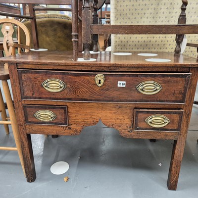 Lot 1190 - An 18th century oak low boy / side table