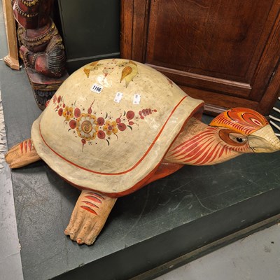Lot 1196 - A decorative paper mache figure of a tortoise