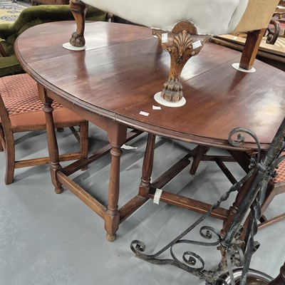 Lot 946 - A Large gateleg table. H 71 W 150 D 104cms