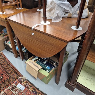 Lot 956 - A retro dining table