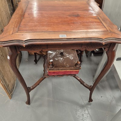 Lot 1015 - A mahogany occasional table and a stool