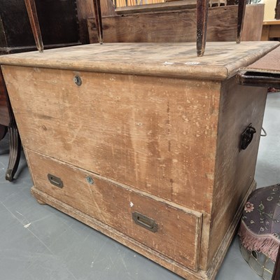 Lot 1031 - A Victorian pine blanket box with base drawer....