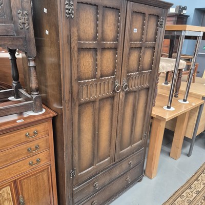 Lot 1057 - An oak wardrobe