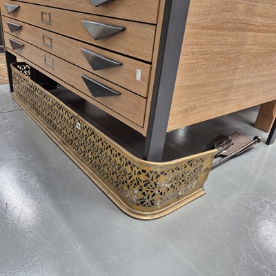 Lot 1062 - A brass fire fender, fire tools and a footman