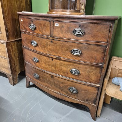 Lot 1075 - A 19th-century mahogany bow-front chest of...