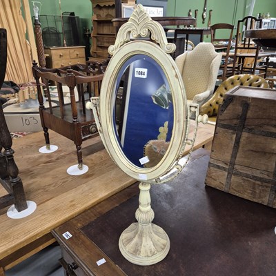 Lot 1084 - A small swing mirror