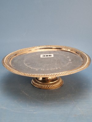 Lot 386 - A Britannia silver paten, London 1707,...