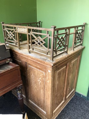 Lot 110 - A vintage cashiers desk.