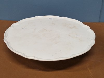 Lot 401 - An 1877 Mintons white glazed pottery lazy...