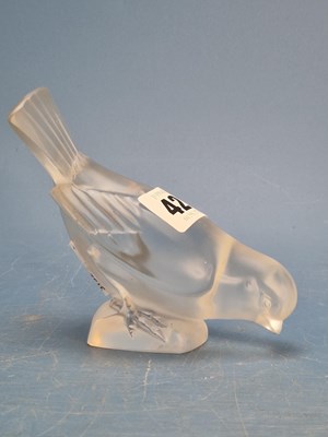 Lot 423 - A Lalique frosted glass figure of a small bird...