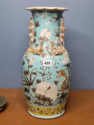Lot 425 - A Canton turquoise ground vase with a polished...