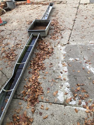 Lot 633 - Two galvanised metal troughs, together with a...