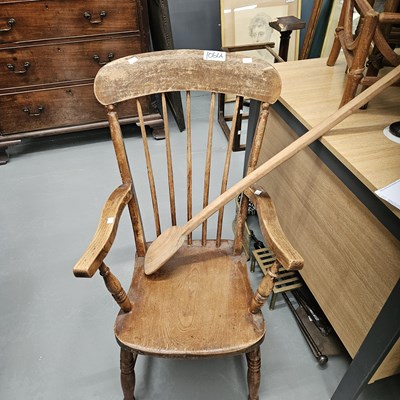 Lot 1061A - A spindle back armchair and a large wooden spoon