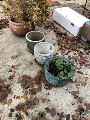 Lot 637 - Three various plant pots and a large...