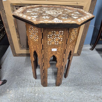 Lot 442 - An Islamic marquetried octagonal table, the...