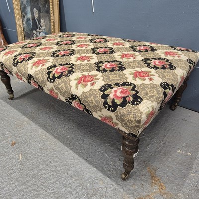 Lot 443 - An oak stool upholstered in wool needle work...