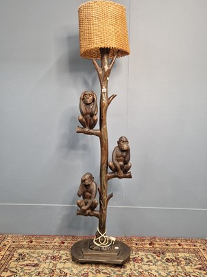 Lot 445 - A Black Forest stained wood standard lamp...