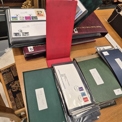 Lot 630 - A group of various first day covers in albums