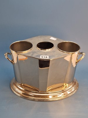 Lot 518 - An electroplate two handled wine cooler,the...