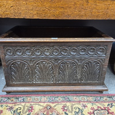 Lot 536 - An oak rectangular wood box carved in relief...