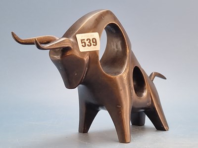 Lot 539 - A bronze figure of a stylised buffalo.   W 28cms.