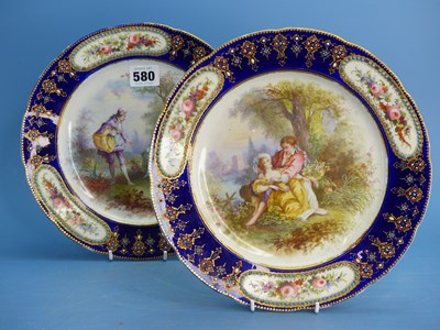 Lot 580 - A pair of 'Sevres' plates, the jewelled bleu...