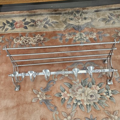 Lot 734A - A metal wall mounted hat and coat rack