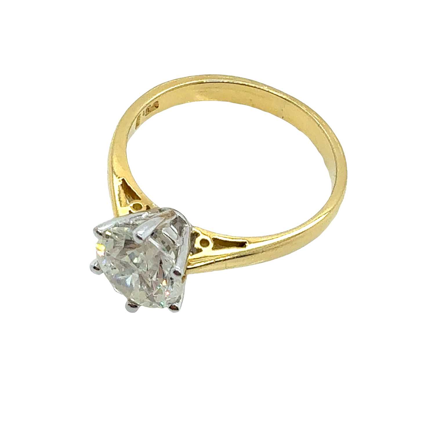 Lot 11 - An 18ct hallmarked gold diamond single stone...