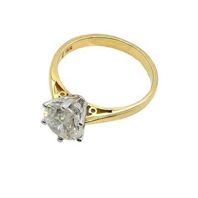 Lot 11 - An 18ct hallmarked gold diamond single stone...