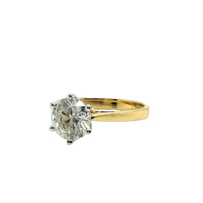 Lot 11 - An 18ct hallmarked gold diamond single stone...
