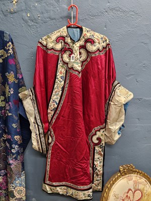 Lot 607 - A Chinese red silk threequarter length robe,...