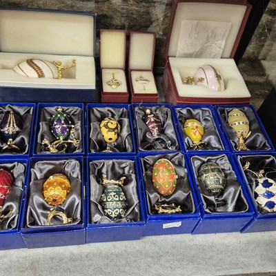 Lot 609 - A collection of boxed Atlas Editions Faberge...