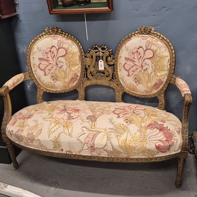 Lot 610 - A French gilt wood settee, the back with a...