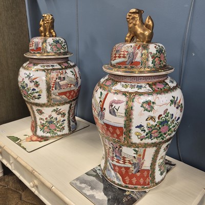 Lot 614 - A pair of modern Canton baluster jars...
