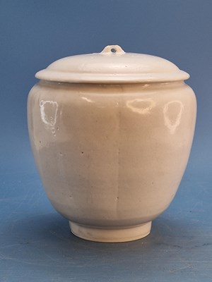 Lot 635 - A slightly lobed white glazed porcelain jar...
