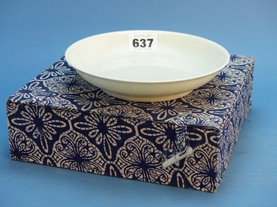 Lot 637 - A Chinese white glazed dish, six character...