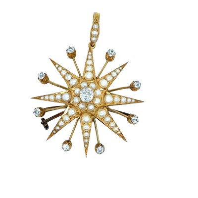 Lot 19 - An antique diamond and pearl starburst pendant...