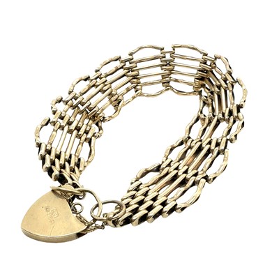 Lot 25 - A vintage 9ct hallmarked gold six-bar fancy...