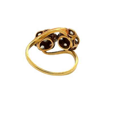 Lot 31 - An antique ring set with two old-cut diamond...