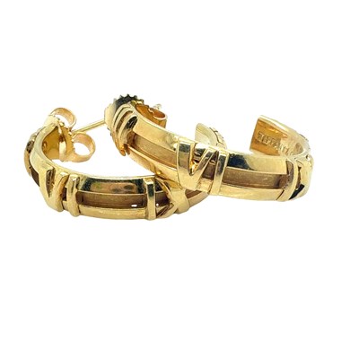 Lot 38 - A pair of Tiffany & Co. 18ct yellow gold hoop...