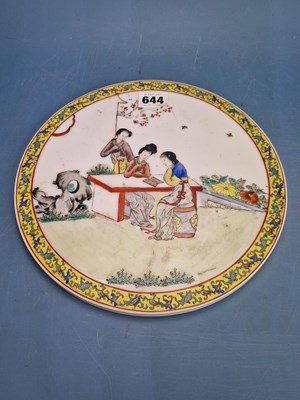 Lot 644 - A Chinese porcelain roundel painted with three...