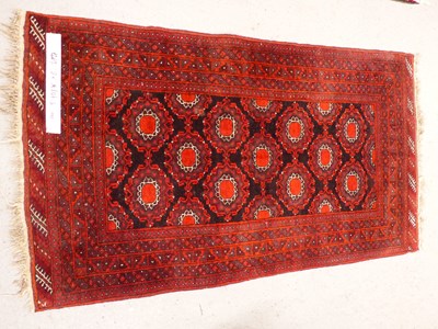Lot 492 - An Afghan Belouch rug, 186 x 101 cm