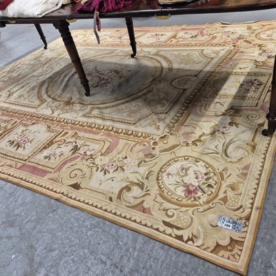 Lot 497 - A needlepoint carpet of Aubusson design