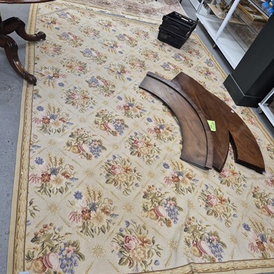Lot 499 - A needlepoint carpet with panels of fruit and...