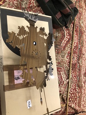 Lot 1076a - A mirrored wall clock